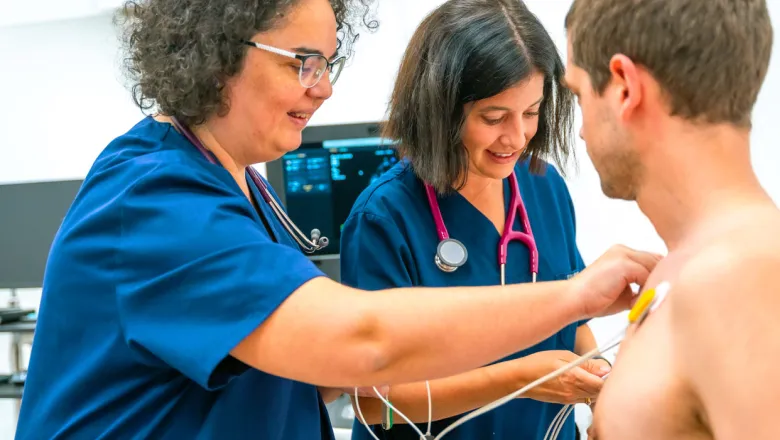 Cardiovascular technology professional smiling while on the job